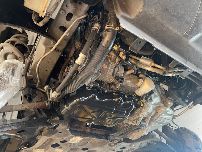 The underside view of an engine.